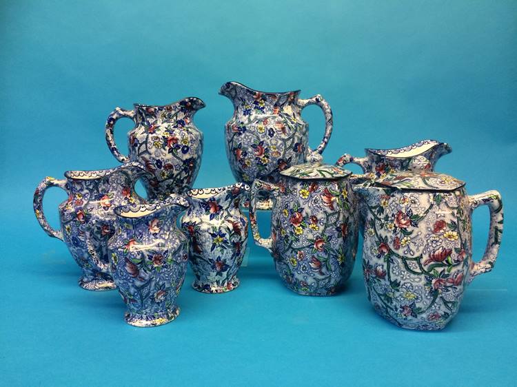 Two sets of four graduated Maling Chintz water jug