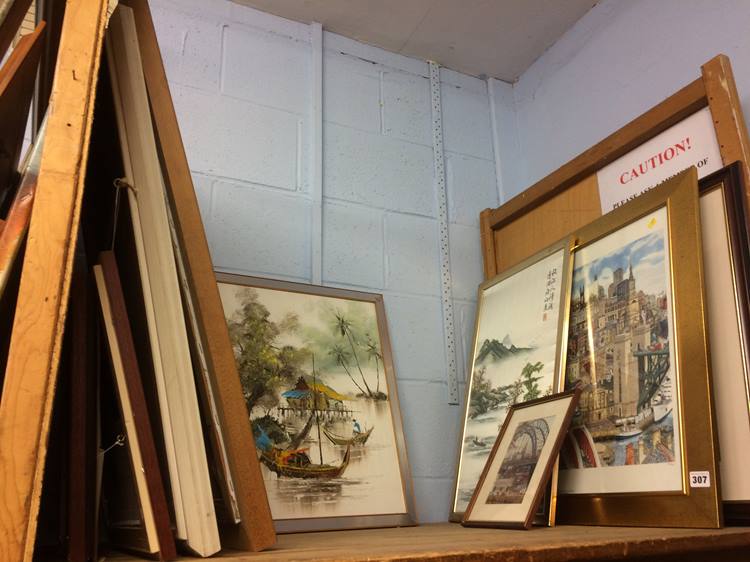 Shelf of prints