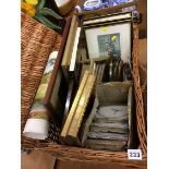 Basket of prints, books, 19th century blue and white tiles etc.