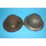 Four Word War II tin helmets