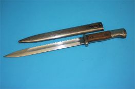 A German Sawback bayonet, stamped Gottlieb Hammesfahr, Solingen, Foche, blade 25cm length