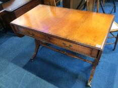 A reproduction sofa table