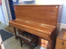 A Steinway and Sons 'Model K' Upright piano, in a walnut veneered high gloss (polyester) finish,