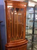 A Yew wood corner cabinet