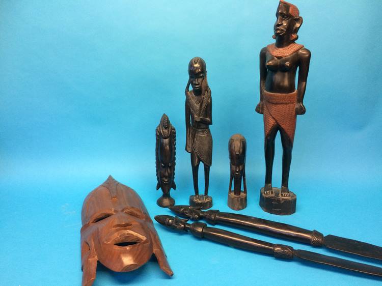 A collection of carved African items