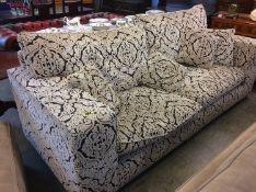 A large and good quality floral Barker and Stonehouse type three seater settee, 248cm length