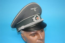 A German Infantry Officer's visor cap, stamped Pekuro, Berlin, Sonderklasse