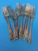 A collection of 11 silver forks, various makers and dates, 20.8 oz