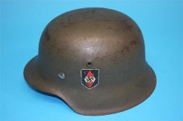 A German M42 single decal tin helmet