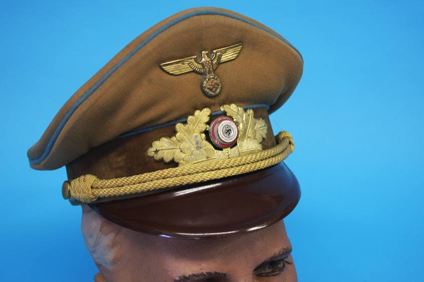 A German Gebirgstruppe (Mountain Troop) Officer's visor cap, gold coloured aluminium cap cords and