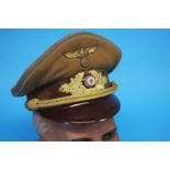 A German Gebirgstruppe (Mountain Troop) Officer's visor cap, gold coloured aluminium cap cords and