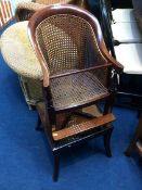 A Victorian mahogany beige child's high chair and stand