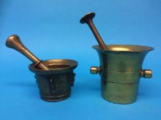 Two brass pestles and mortars