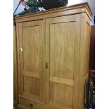 A pine double door wardrobe