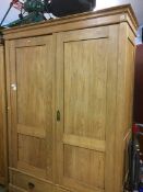 A pine double door wardrobe