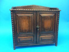 An oak smokers cabinet