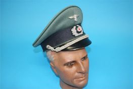 A German Army Administration Officer's visor cap, stamped Stirndruckfrei Deutsches Reichspatent