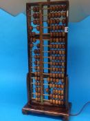 An abacus converted into a table lamp