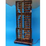 An abacus converted into a table lamp