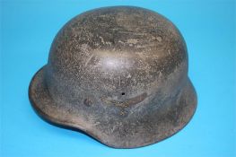A World War II German Luftwaffe single decal helmet