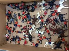 Quantity of Britains and other painted lead figures, marching bands etc.