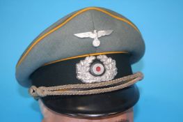 A German Cavalry Officer's visor cap, stamped Erel, by Robert Lubstein, Berlin