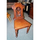 Victorian mahogany shield-back hall chair on octag