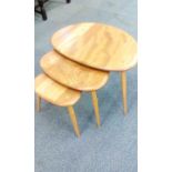 Ercol nest of three tables, in blonde elm on splay