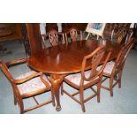 Victorian mahogany oval top dining table with win