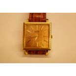 Piaget. A rare gents square wristwatch in 18ct gol