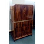 Art deco tallboy in exotic wood, a blind cabinet o