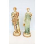 Pair early 20th figures in the style of Royal Dux,