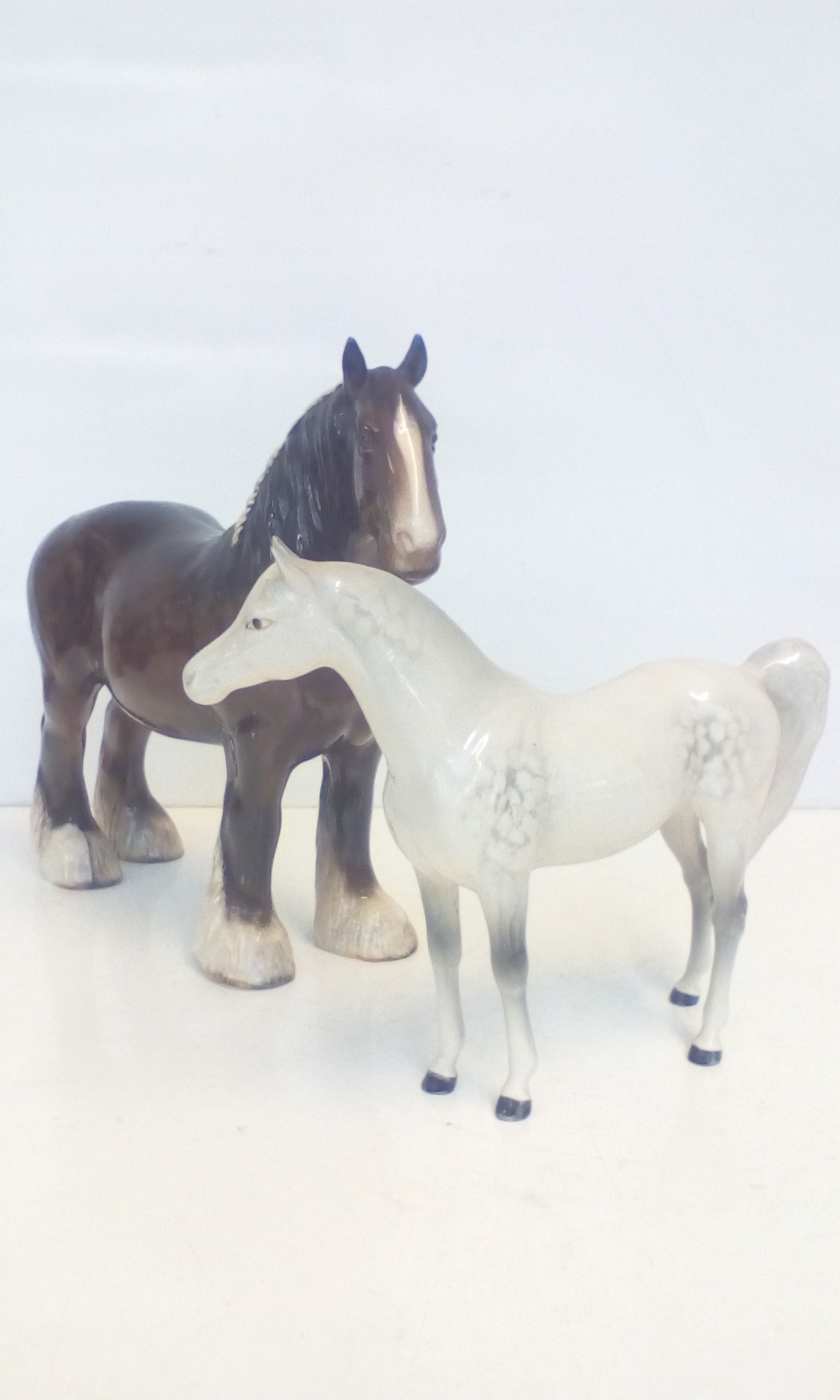 Beswick horse and one similar example, nibble to e