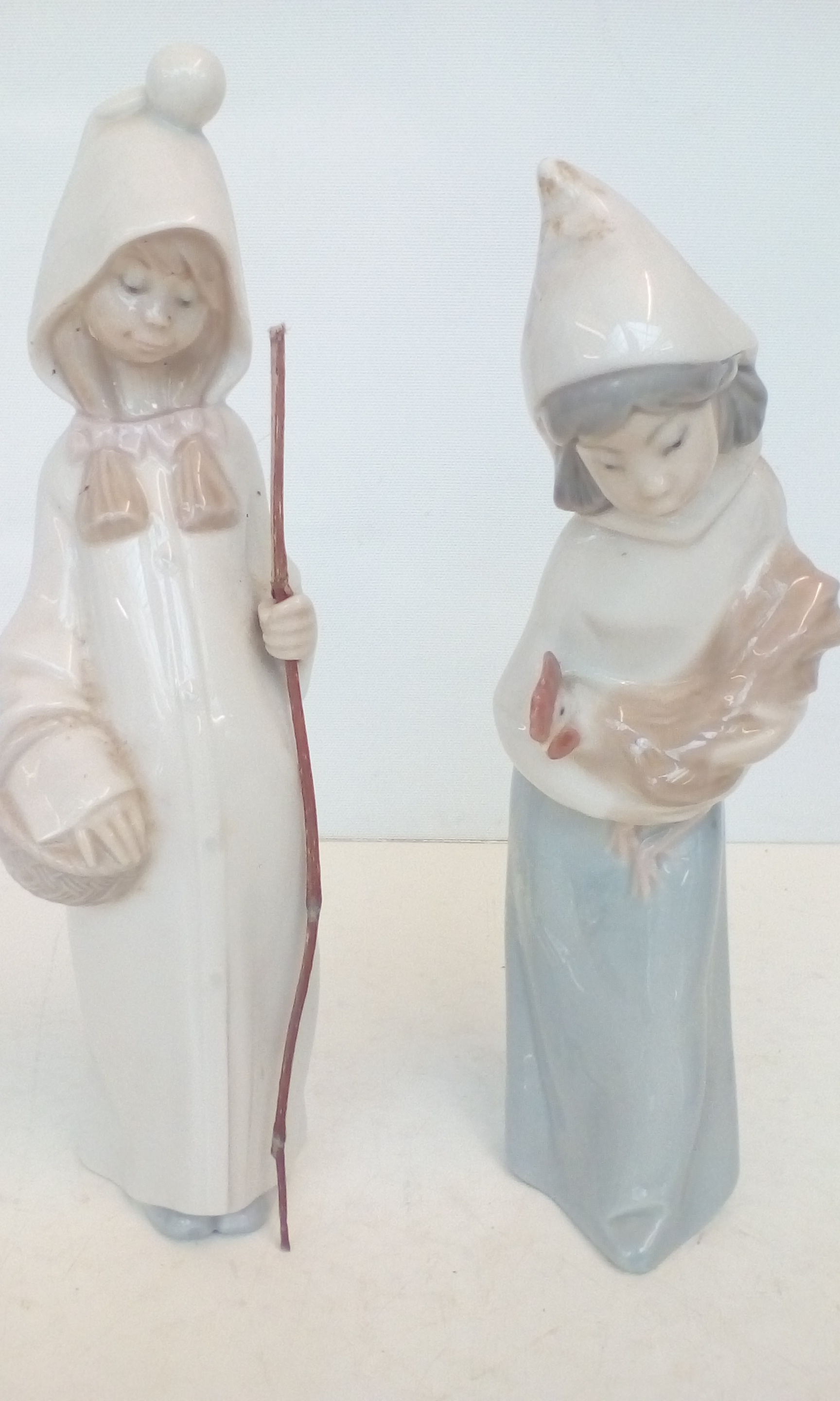 Two Lladro figures, height of largest 22cm