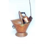 Copper helmet shaped coal scuttle and contents