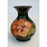 Moorcroft vase in the Coral Hibiscus pattern, with