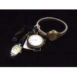 Silver cased vintage wristwatch with one other