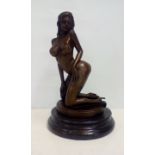 Erotic bronze nude on a marble base, in the style