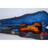 Cased violin