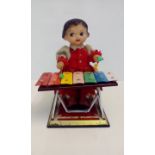 Chinese mid century tin and rubber clockwork toy,