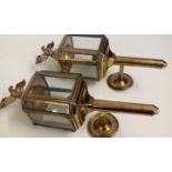 Pair of brass wall lights in the form of lanterns