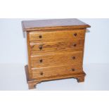 Miniature oak chest of drawers with dovetailed dra