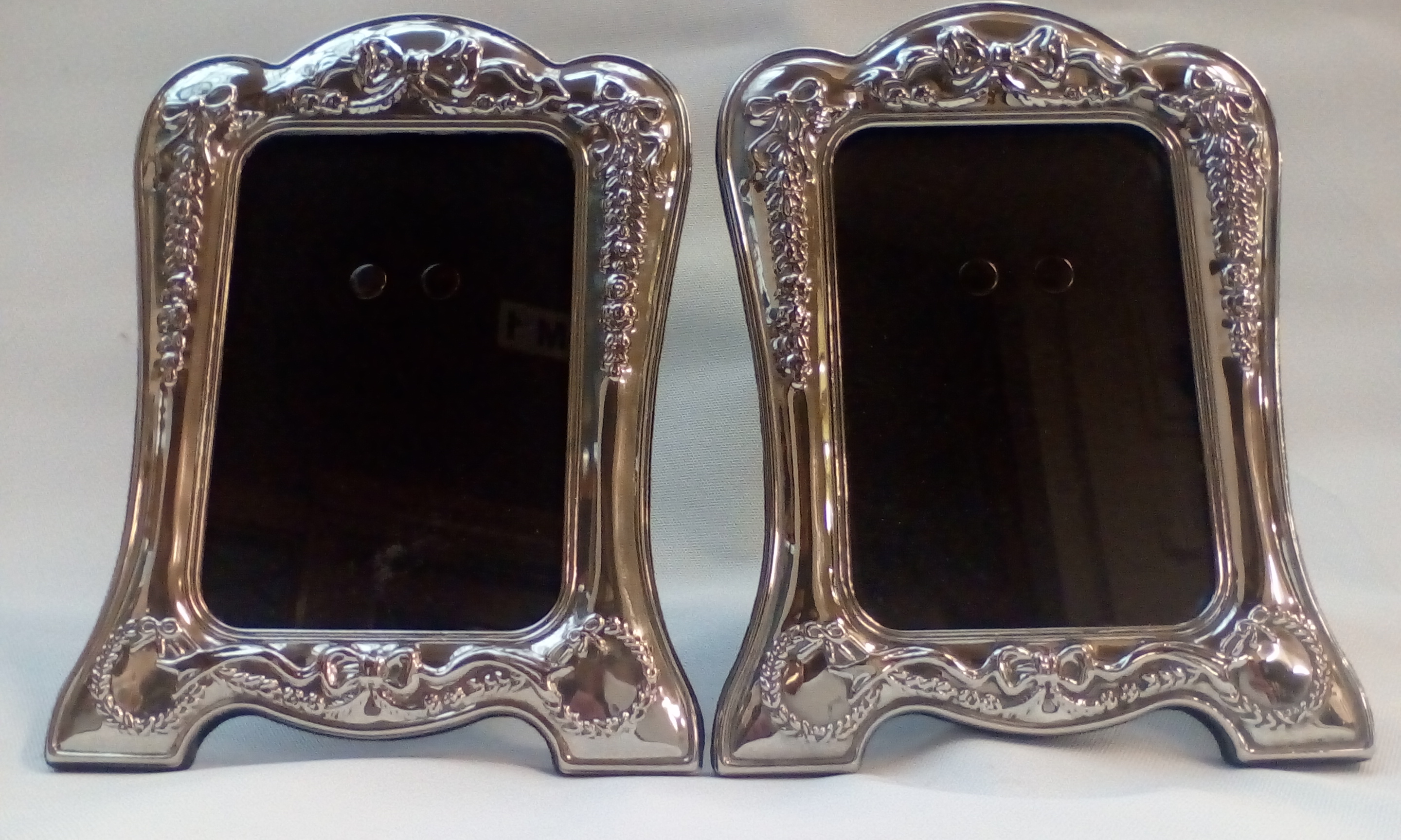 Pair of matching silver plated photo frames