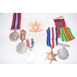 Group of World War II medals together with a Silve