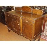 Oak sideboard with raised back, an array of three