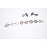 A bracelet with silver threepence coins with silve