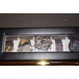 Cased group of five fashion watches, well presente