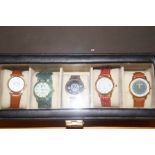 Cased group of five fashion watches, well presente