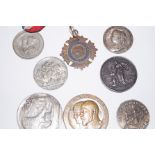 Collection of coins and badges
