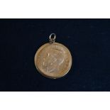 1915 mounted full sovereign. Total weight 9.2 gram